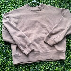 a cropped crewneck sweatshirt